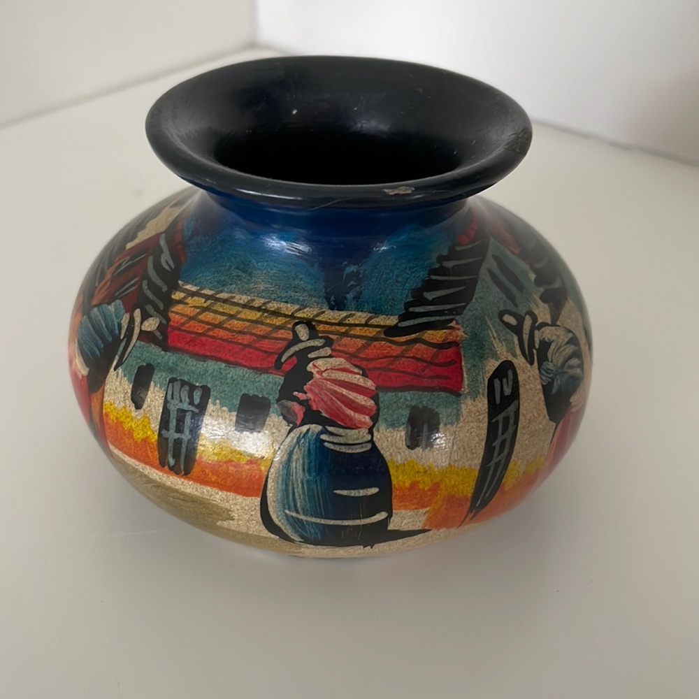 Pottery vase signed Adalid, multicolored with village houses and people